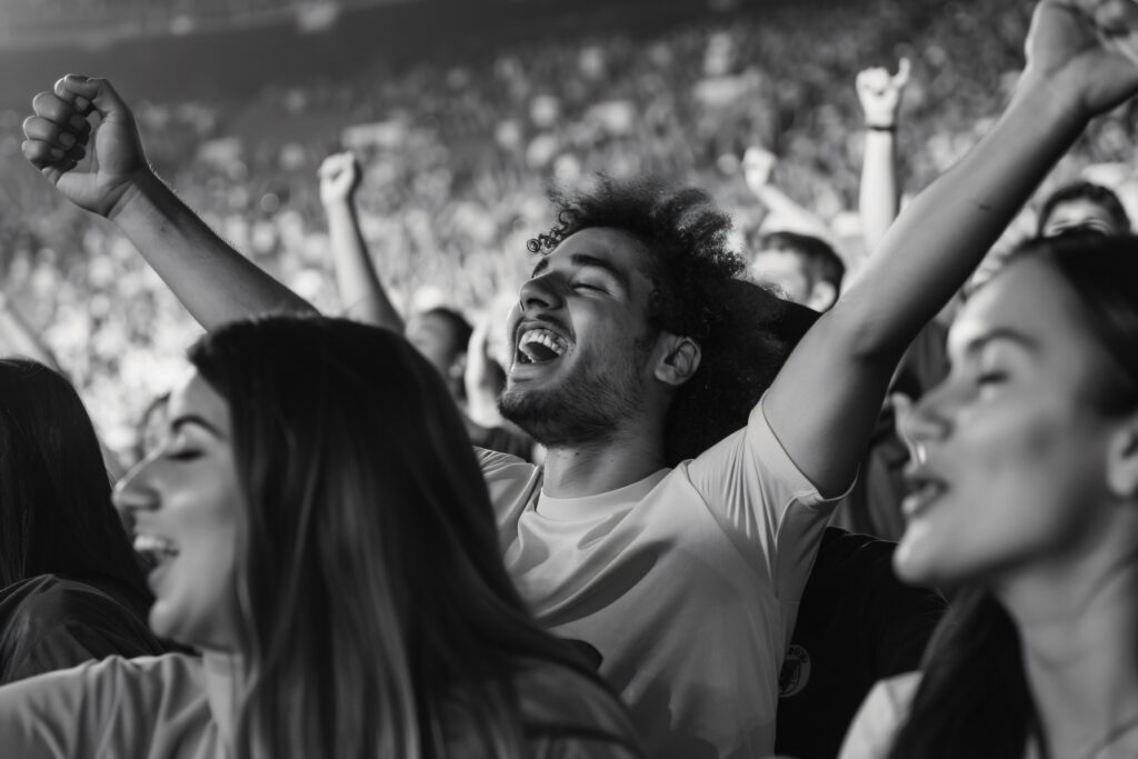 monochrome soccer fans cheering