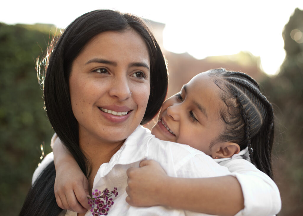 woman spending mothers day with her daughter outdoors park